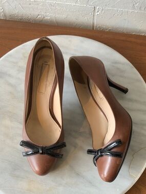 Prada Brown Leather Pointed-Toe Pumps with Black Bow Accent